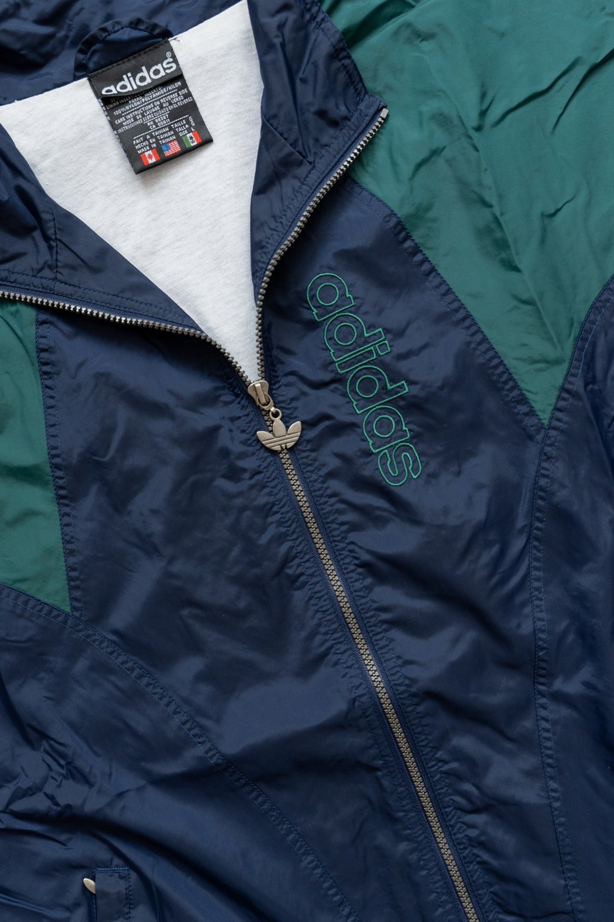 Rompevientos Adidas Trefoil 90s azul marino y verde