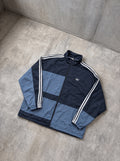 Campera Adidas Originals Asymm azul marino y gris azulado