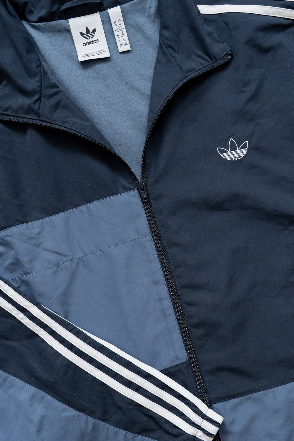Campera Adidas Originals Asymm azul marino y gris azulado