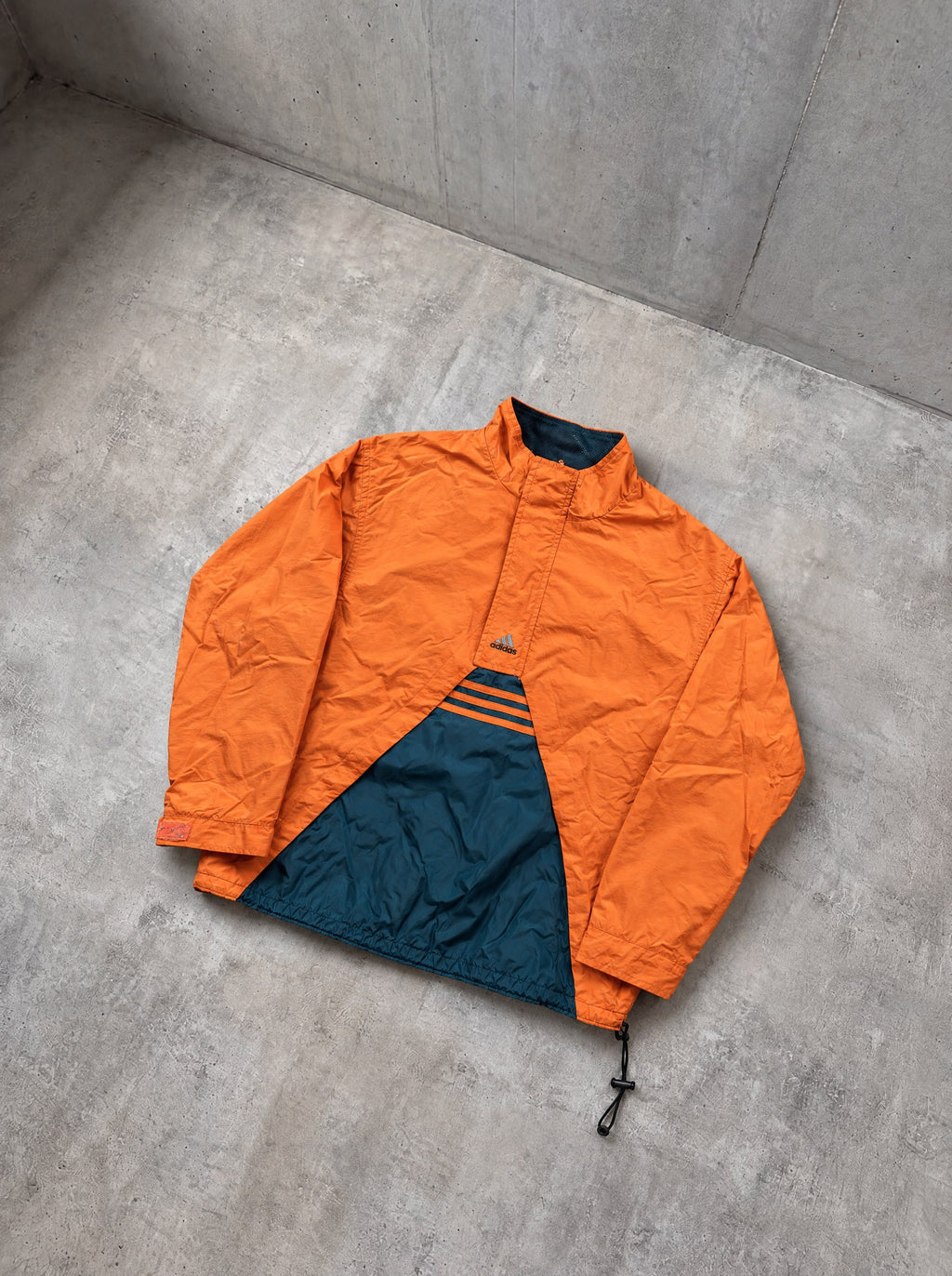 Anorak Adidas Half-Zip 90s naranja y azul petróleo