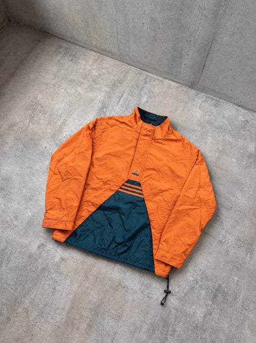 Anorak Adidas Half-Zip 90s naranja y azul petróleo