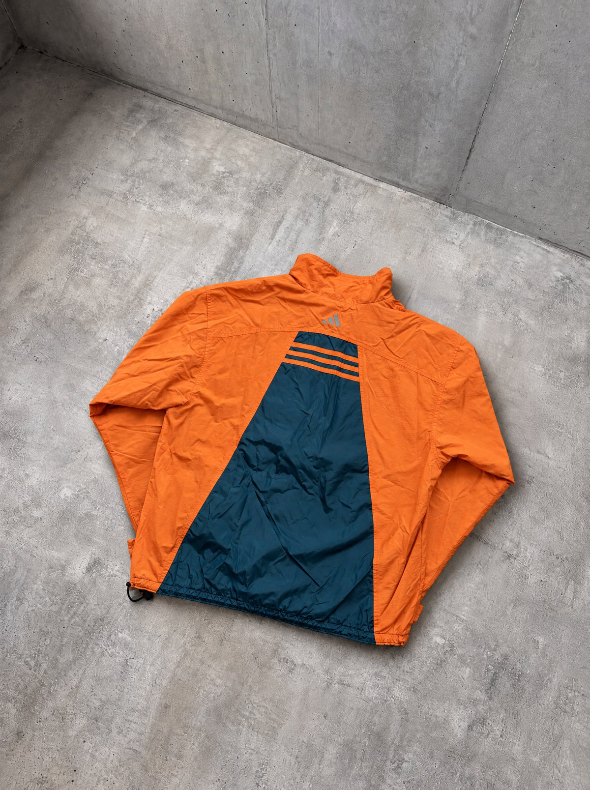 Anorak Adidas Half-Zip 90s naranja y azul petróleo