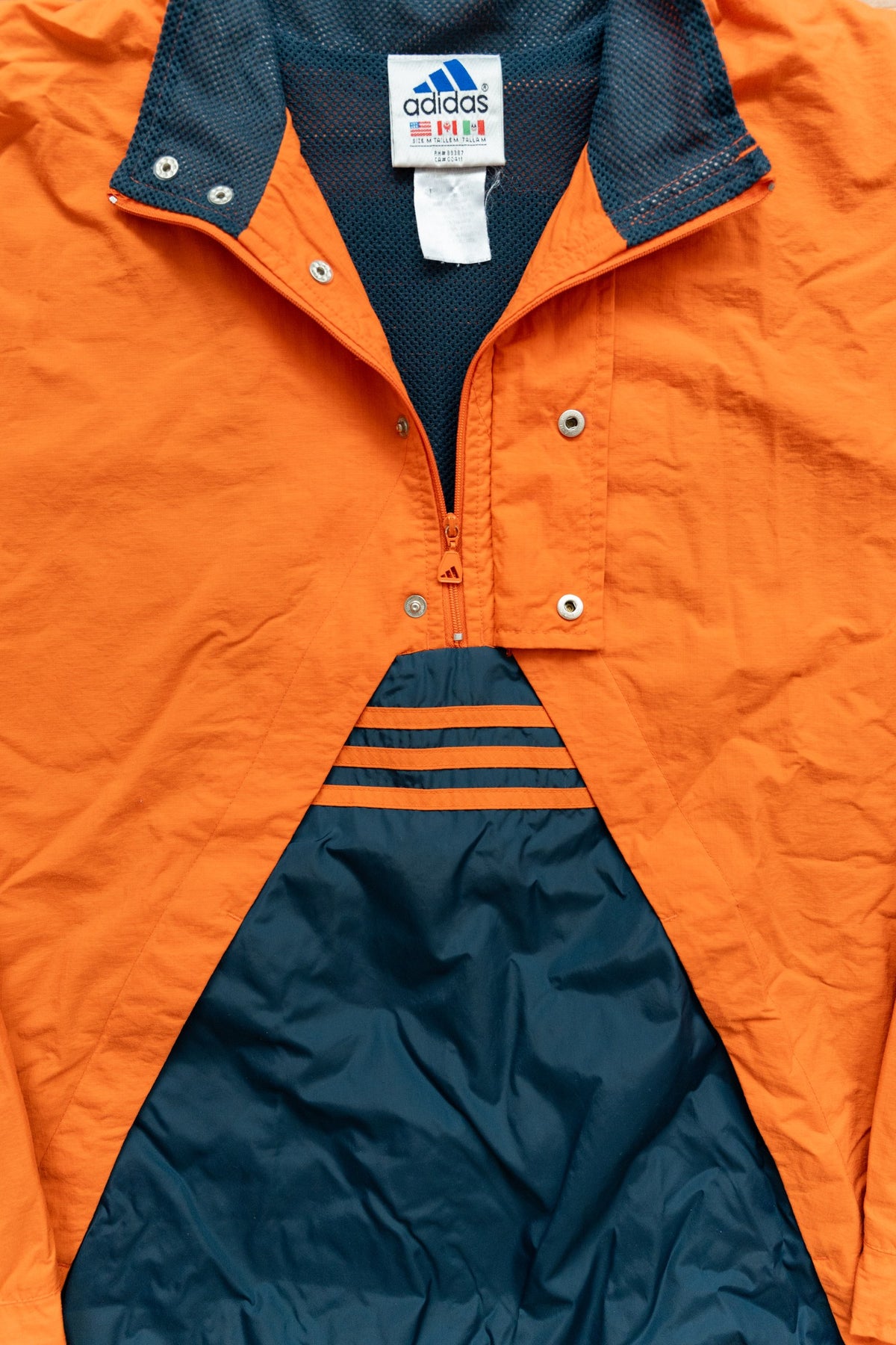 Anorak Adidas Half-Zip 90s naranja y azul petróleo