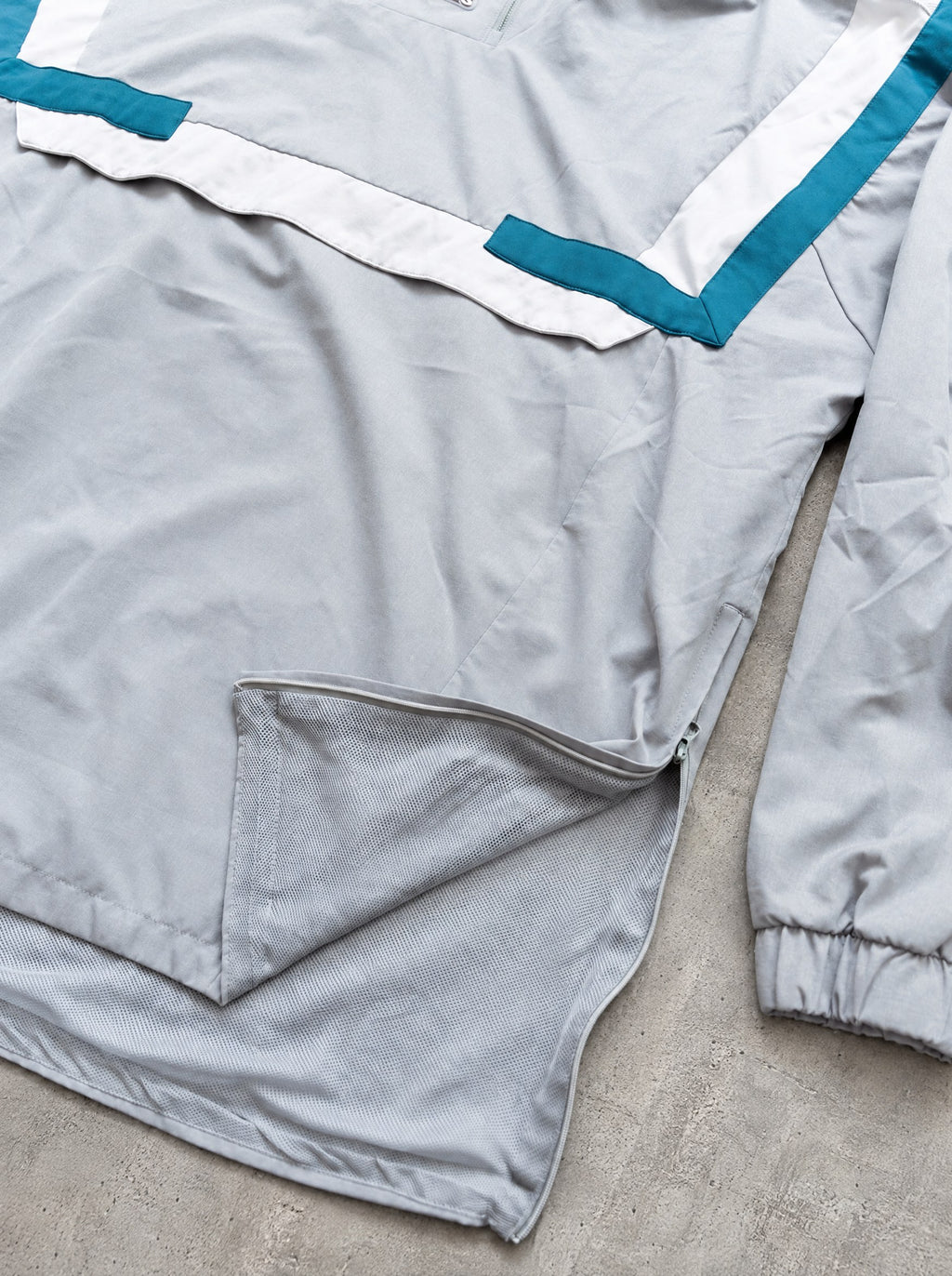 Anorak Adidas Originals gris y verde petróleo